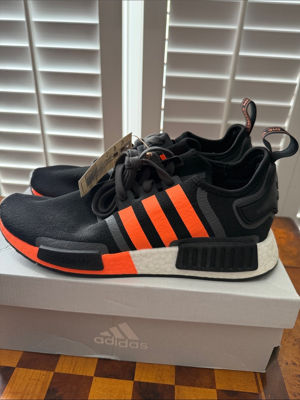 adidas Men’s Black Sneakers with Bright Orange Stripes